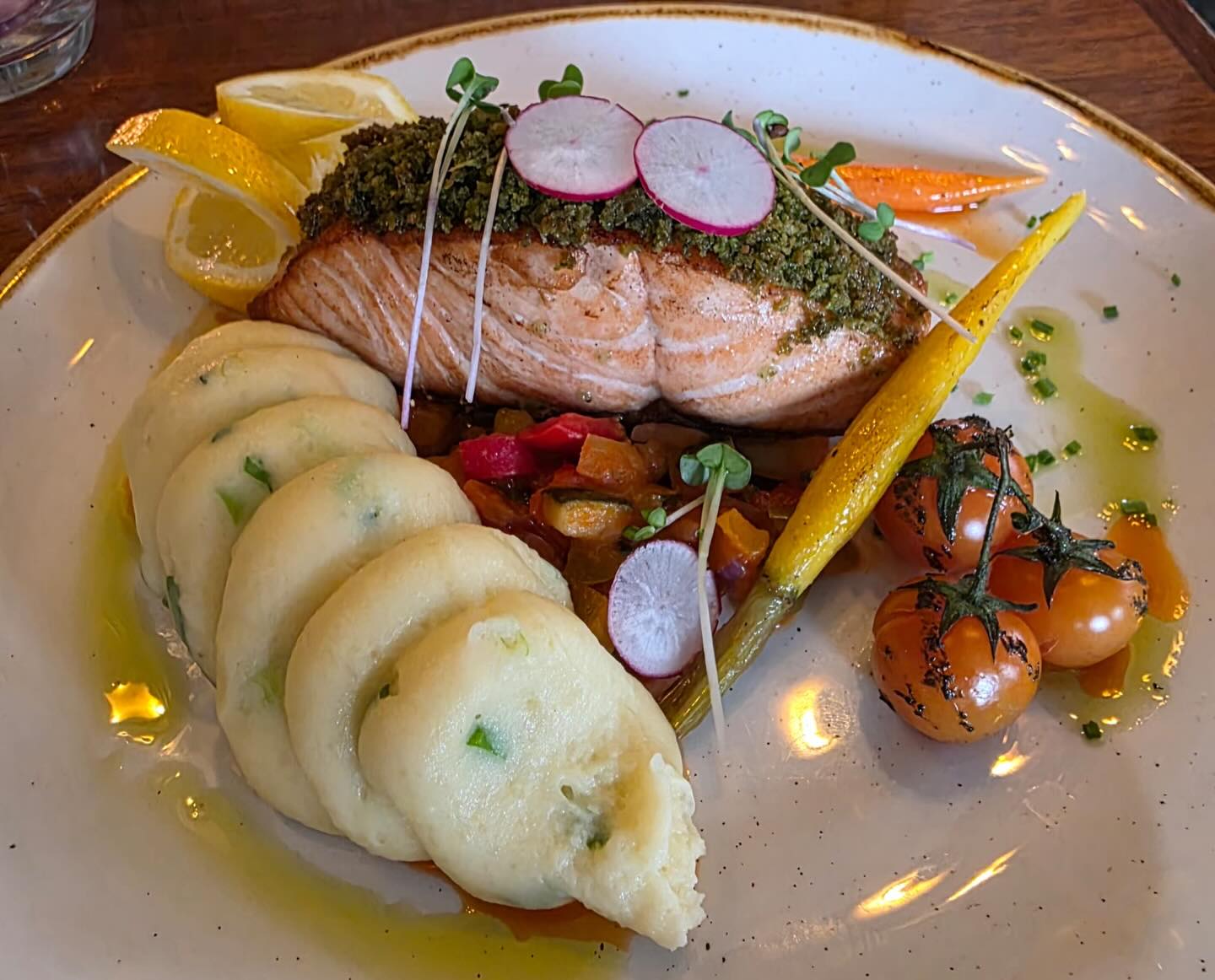 A fresh salmon special with potatoes and vegetables